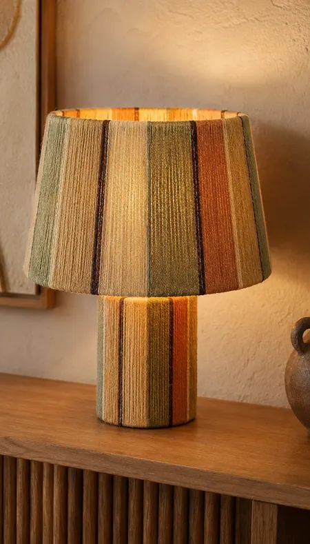 Table lamp with hand-wrapped natural fiber shade